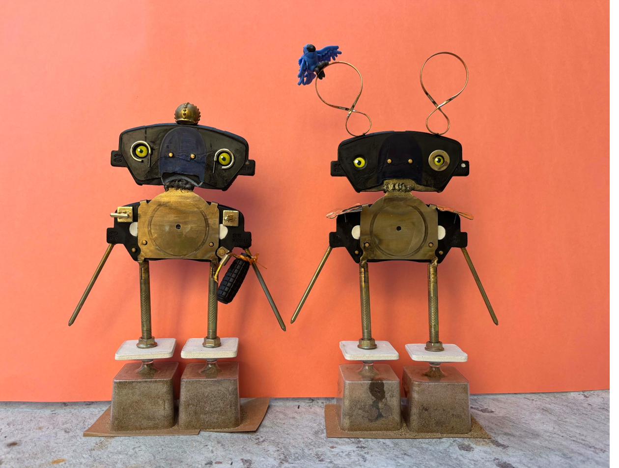 Pair of recycled assemblage robot figures